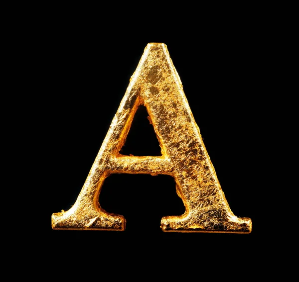 Alphabet and numbers in gold leaf — Stock Photo, Image