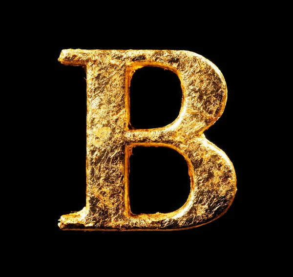 Alphabet and numbers in gold leaf — Stock Photo, Image