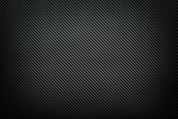 Фон тёмного углеродного волокна — стоковое фото