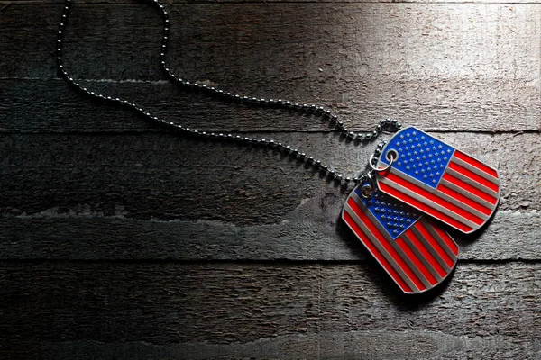 USA dog tags on wooden background — Stock Photo, Image