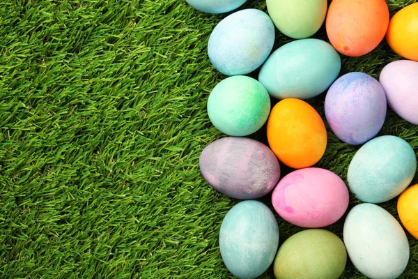 Colorful Easter eggs on grass background — Stock Photo, Image