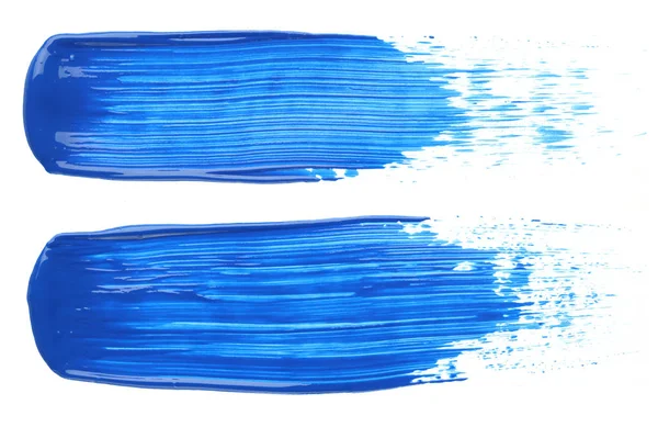 पांढरा वर वेगळे दोन निळा पेंट स्मिअर — स्टॉक फोटो, इमेज
