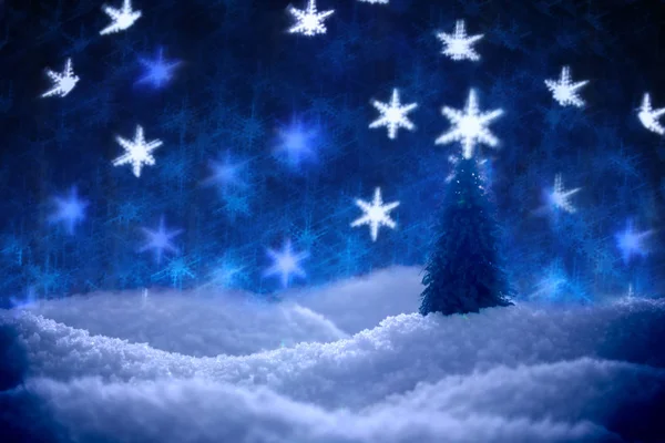 Single tree in snow surrounded by a bokeh of glittering lights i — Stockfoto