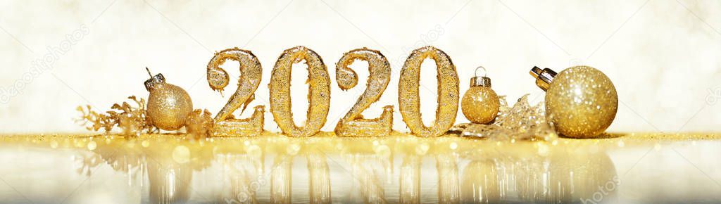 2020 in sparkling gold numbers celebrating the New Year or Chris