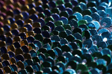 Parlak pullar ve ışıltıların ışıltılı tatil makro arka planı