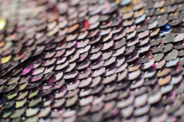 Parlak pullar ve ışıltıların ışıltılı tatil makro arka planı