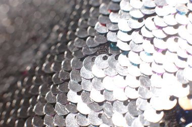 Parlak pullar ve ışıltıların ışıltılı tatil makro arka planı