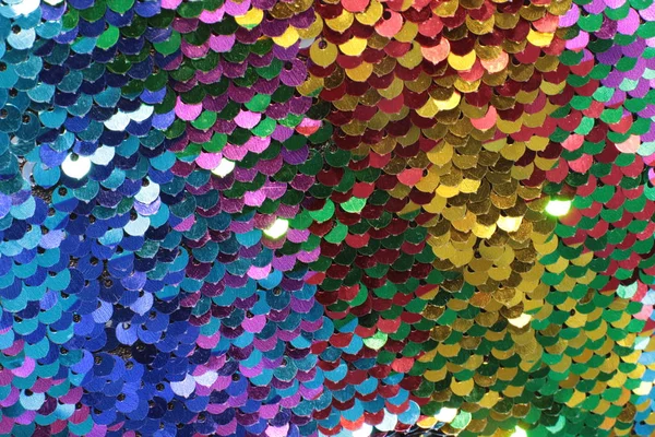 Parlak pullar ve ışıltıların ışıltılı tatil makro arka planı