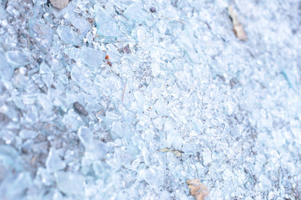 Small sharp shards of glass and pieces of iceblue