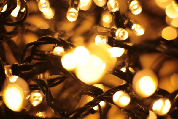 Defocked Lichten Van Warme Schaduw Feestelijke Achtergrond Kerst Slinger Uit — Stockfoto