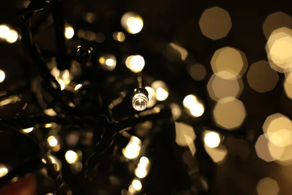 Defocused Lights Warm Shade Festive Background Christmas Garland Out Focus — Stock Photo, Image