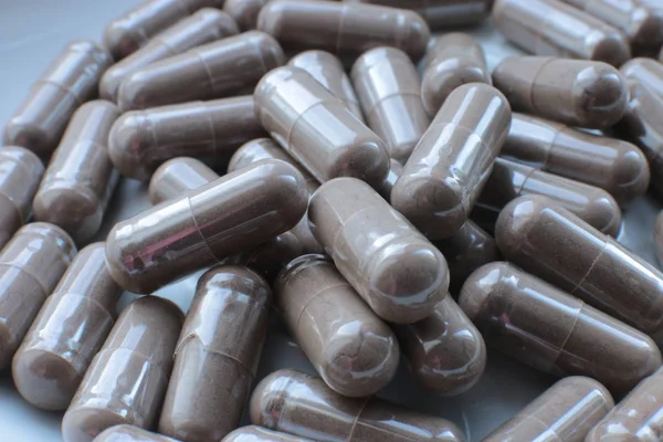 macro background pills, medical bio supplements and vitamins