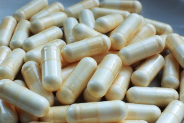  makro arka plan pürüzsüz haplar, tıbbi biyolojik takviyeler ve sağlıklı vitaminler.