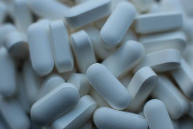  makro arka plan pürüzsüz haplar, tıbbi biyolojik takviyeler ve sağlıklı vitaminler.
