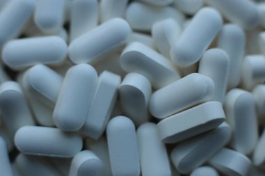  makro arka plan pürüzsüz haplar, tıbbi biyolojik takviyeler ve sağlıklı vitaminler.