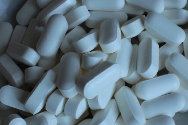  makro arka plan pürüzsüz haplar, tıbbi biyolojik takviyeler ve sağlıklı vitaminler.