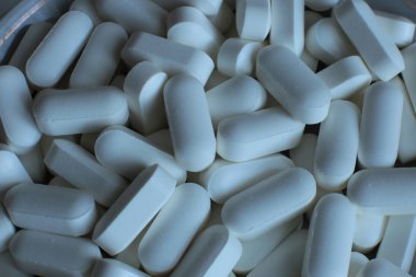  makro arka plan pürüzsüz haplar, tıbbi biyolojik takviyeler ve sağlıklı vitaminler.