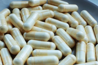  makro arka plan pürüzsüz haplar, tıbbi biyolojik takviyeler ve sağlıklı vitaminler.