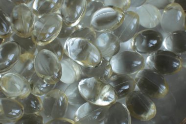 Beslenme takviyeleri. Sağlıklı haplar. Makro görünüm tıbbi geçmiş.