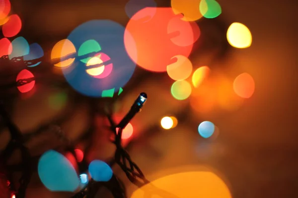 Multicolor Bloemenslinger Bokeh Kerst Achtergrond — Stockfoto