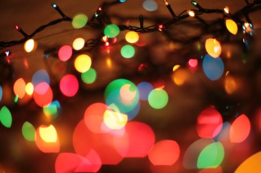 Odak dışında çok renkli zarif çelenk Bokeh Noel makro arkaplanı