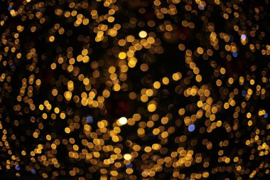 Odaklanamayan yeni yıl makro arkaplan çelengi farklı ışıklandırma renkleri tatil dekorasyonu