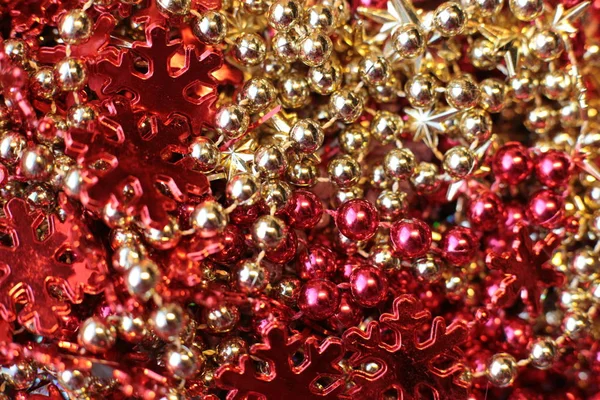 shiny bright ball and garland as beads for decorating the christmas tree festive shiny background