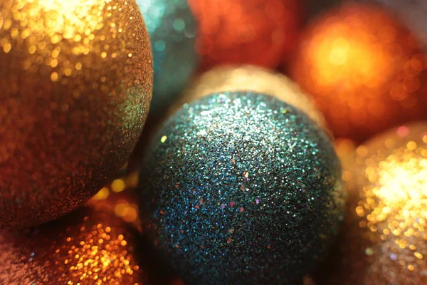 shiny bright background ball and garland as beads for decorating the Christmas tree festive macro objects