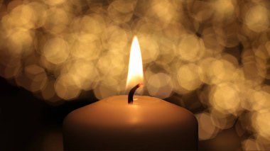 Tebrik kartı makro alevi. Mumlar arka plan yanar.