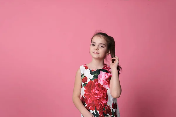 Smiling Girl Eight Years Old Beautiful Dress Pink Background Joyful — Stok fotoğraf