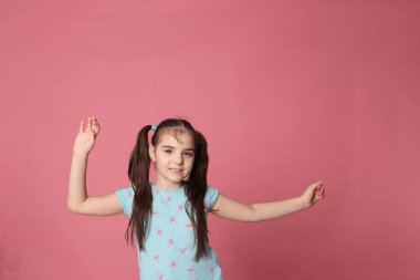  beautiful happy girl of eight years with long hair 