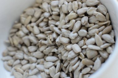 Ayçekirdeğinin Macro fotoğrafı, taze çiğ vejetaryen yemeği.