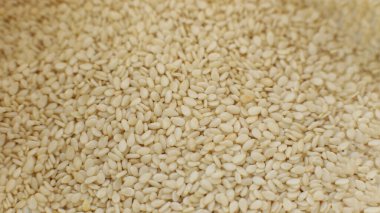 Susam tohumlarının Macro fotoğrafı, taze çiğ vejetaryen yemeği.