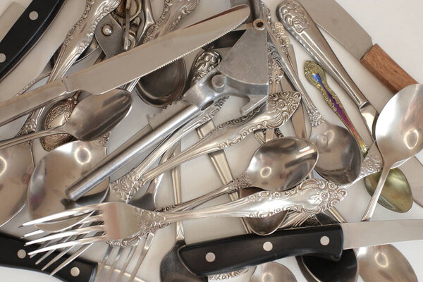 clean cooking utensils for daily use, empty dishes on a white table background