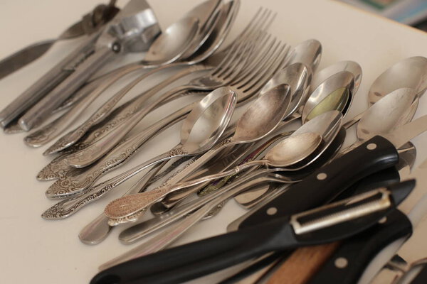 clean cooking utensils for daily use, empty dishes on a white table background