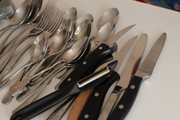 clean cooking utensils for daily use, empty dishes on a white table background