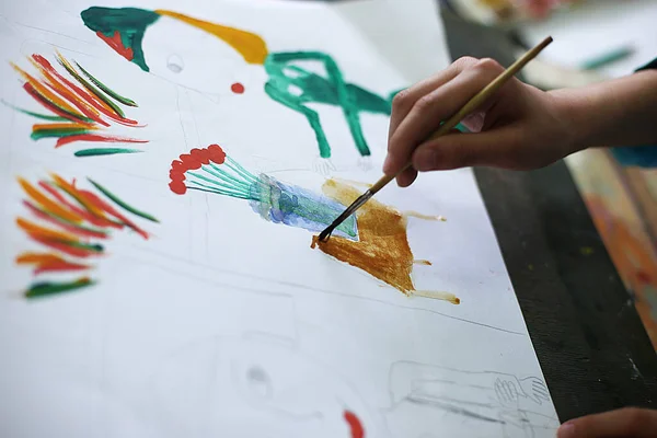 a lesson in an art school for children on paint, modeling and application, future artists create masterpieces