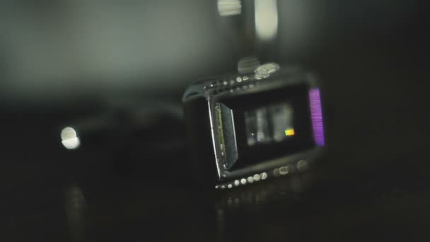 Cuff link from the shirt on a dark background — Stock Video