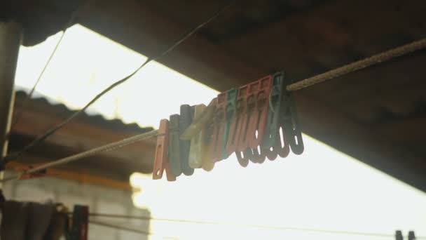 Old colored clothespins — Stock Video