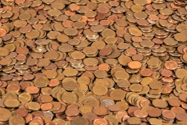Thousands of golden, silver and copper coins — Stock Photo, Image