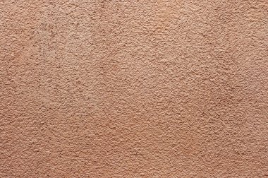 Turuncu sıva dokulu duvar arka plan