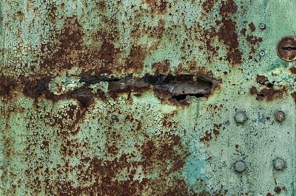 Metal enferrujado com a tinta descascada, superfície corroída de metal velho. Textura antiga para fundos . — Fotografia de Stock