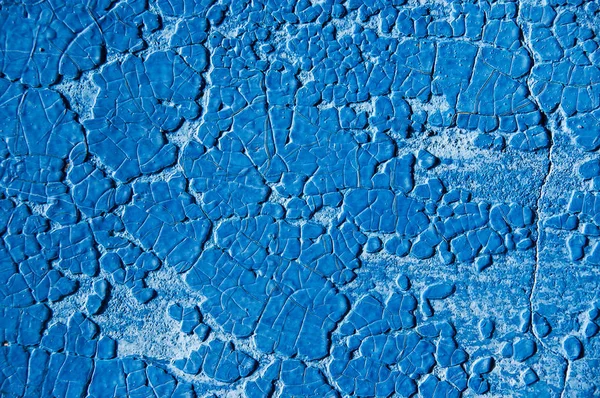 Parede azul com uma espessa camada de tinta antiga. Textura — Fotografia de Stock