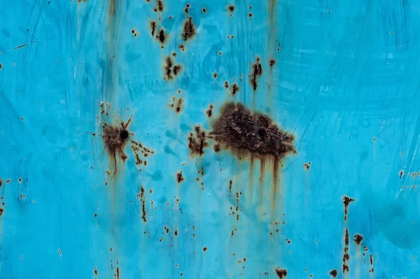 Rust with turquoise painted background Stock Picture