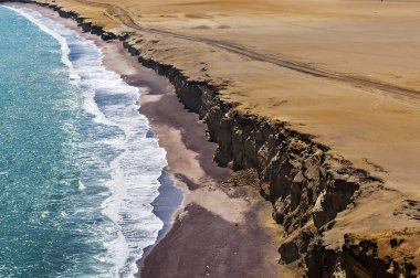 Kıyı şeridi, Paracas National Reserve, ICA bölge, Peru. Paracas çöl. Atacama çölü. Kayalıklardan Paracas Ulusal rezerv Pasifik Peru sahil üzerinde