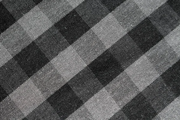 Černá a bílá kostkovaná tkanina — Stock fotografie