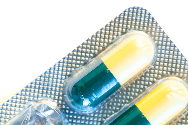 Pílulas Medicinais Embalagem Iniciada Macro Isolar — Fotografia de Stock