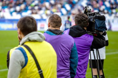 TV kanalı operatörleri bir spor oyunu çekiyor