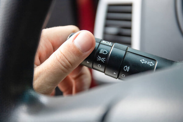 close-up of a turn signal knob in a car