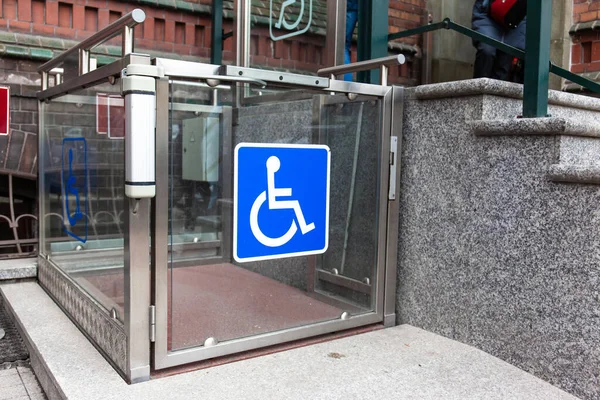 modern wheelchair lift near the building